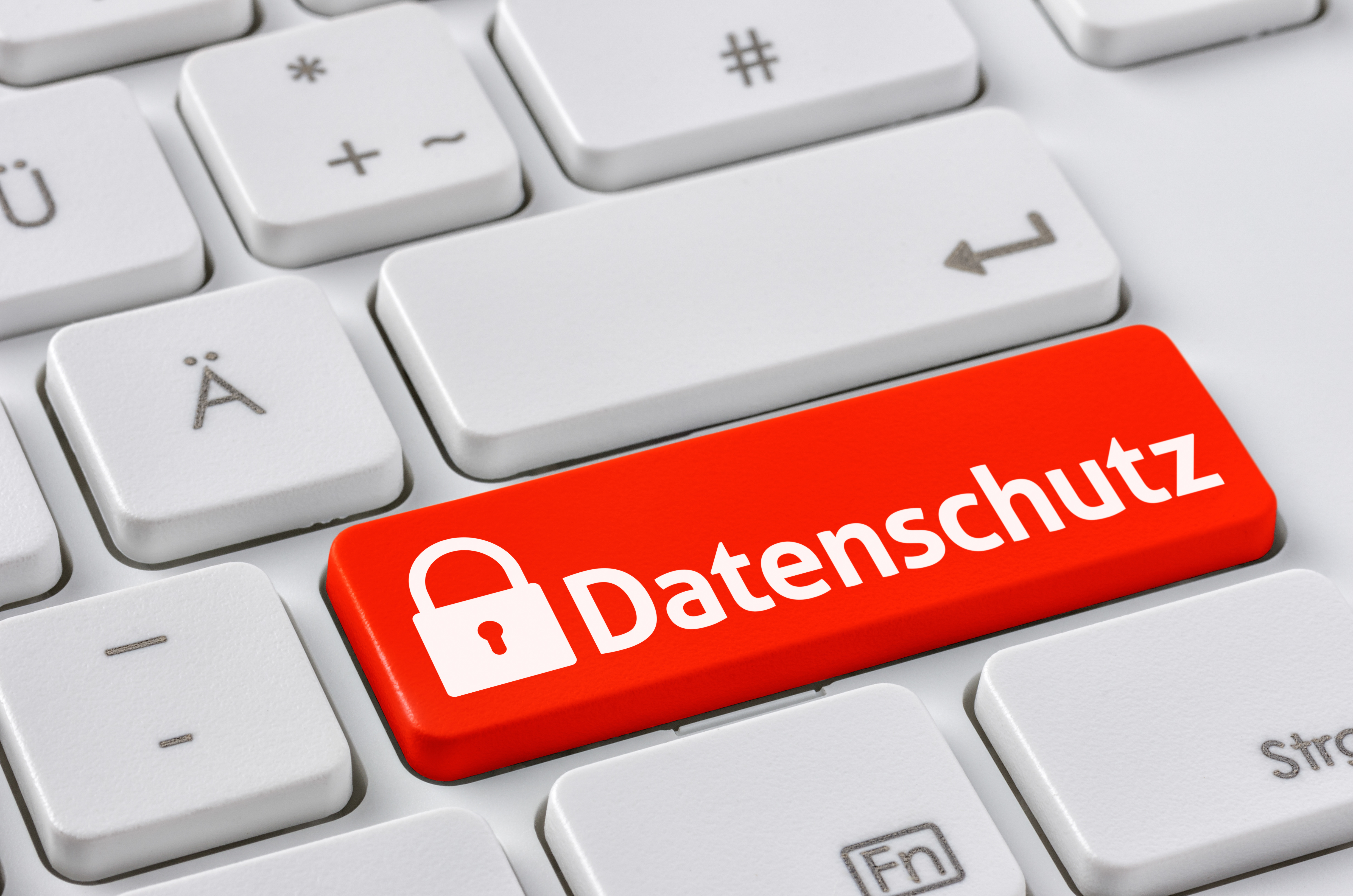 Tastatur mit farbiger Taste "Datenschutz" (Symbolbild)