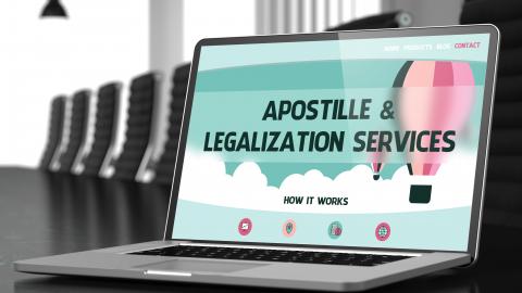 Apostille and Legalization Services Concept on Laptop Screen.